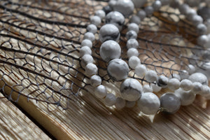 Beautiful black + white faceted Howlite beads give the look of marble and make a classically chic and elegant statement! Mix and match the two sized or with your other faves!  Howlite: This crystal strengthens memory and stimulates desire for knowledge. It teaches patience and helps to eliminate rage, pain and stress. Calms communication, facilitates awareness and encourages emotional expression. Howlite balances calcium levels in the body.