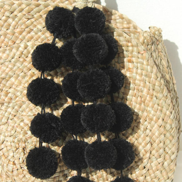 Brunna Luna Bag - Round Straw Tote Bag with Black Tiered Pom-poms